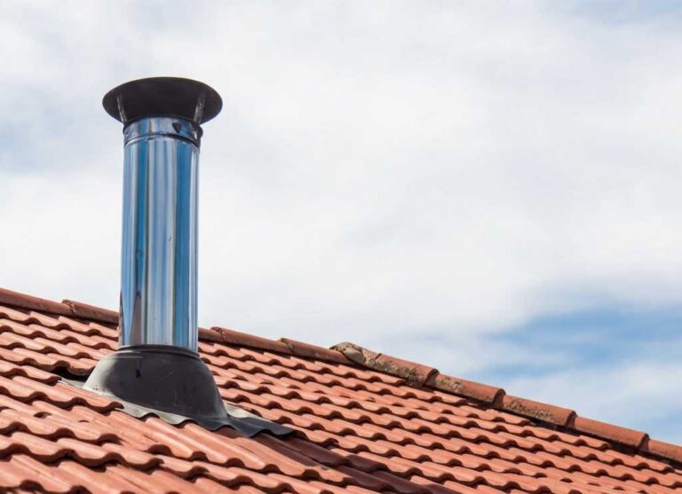 gat boren voor schouw of rookgasafvoer kachel of haard